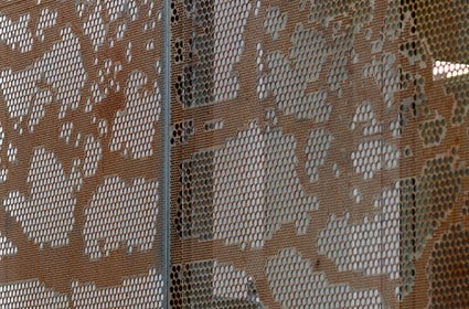 The gabels of the house have been covered with perforated metal sheets.