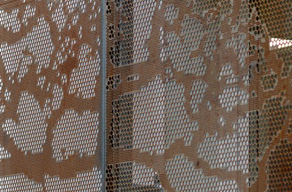 The gabels of the house have been covered with perforated metal sheets. The gabels of the house have been covered with perforated metal sheets.