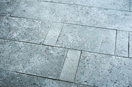 The floor tiles are speckled with crushed stone in different colors.